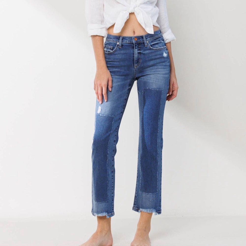 Midrise slim straight jeans with patch work
